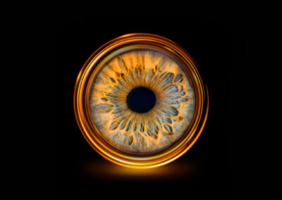 Photographie d’iris en macro haute définition réalisée par LoomiStudio en Suisse, détails des fibres et couleurs naturelles de l’œil humain